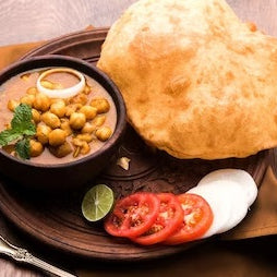 Chole Bhature: The Epic Tale of Spicy Chole and Fluffy Bhature!